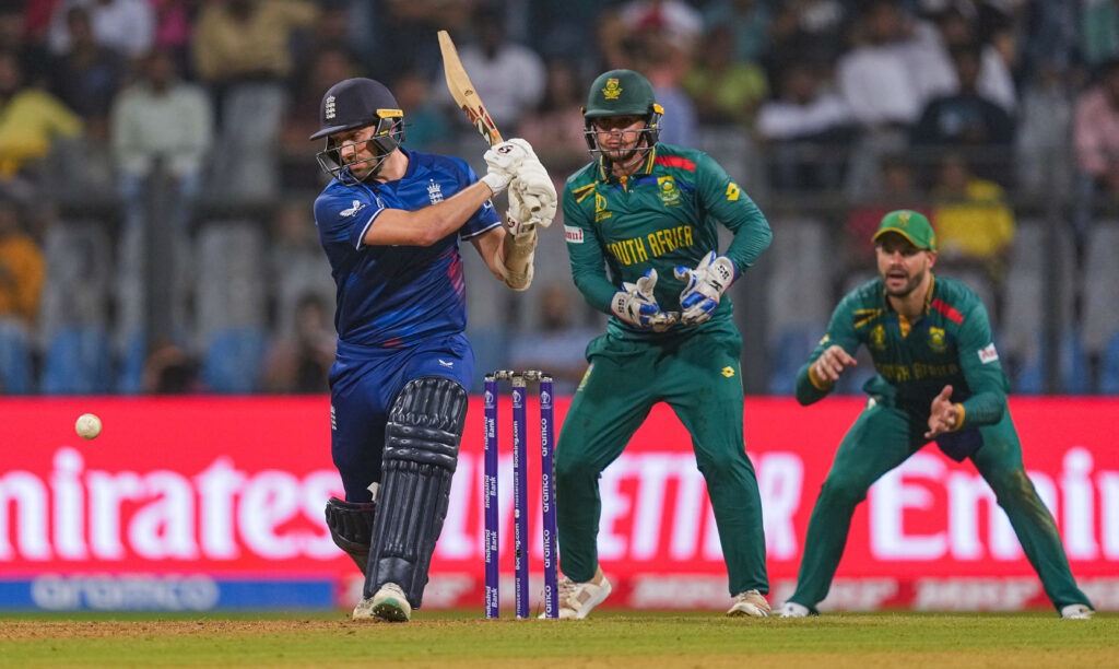 England's Mark Wood plays a shot during the ICC Mens Cricket World Cup 2023 match between England and South Africa, at Wankhede Stadium